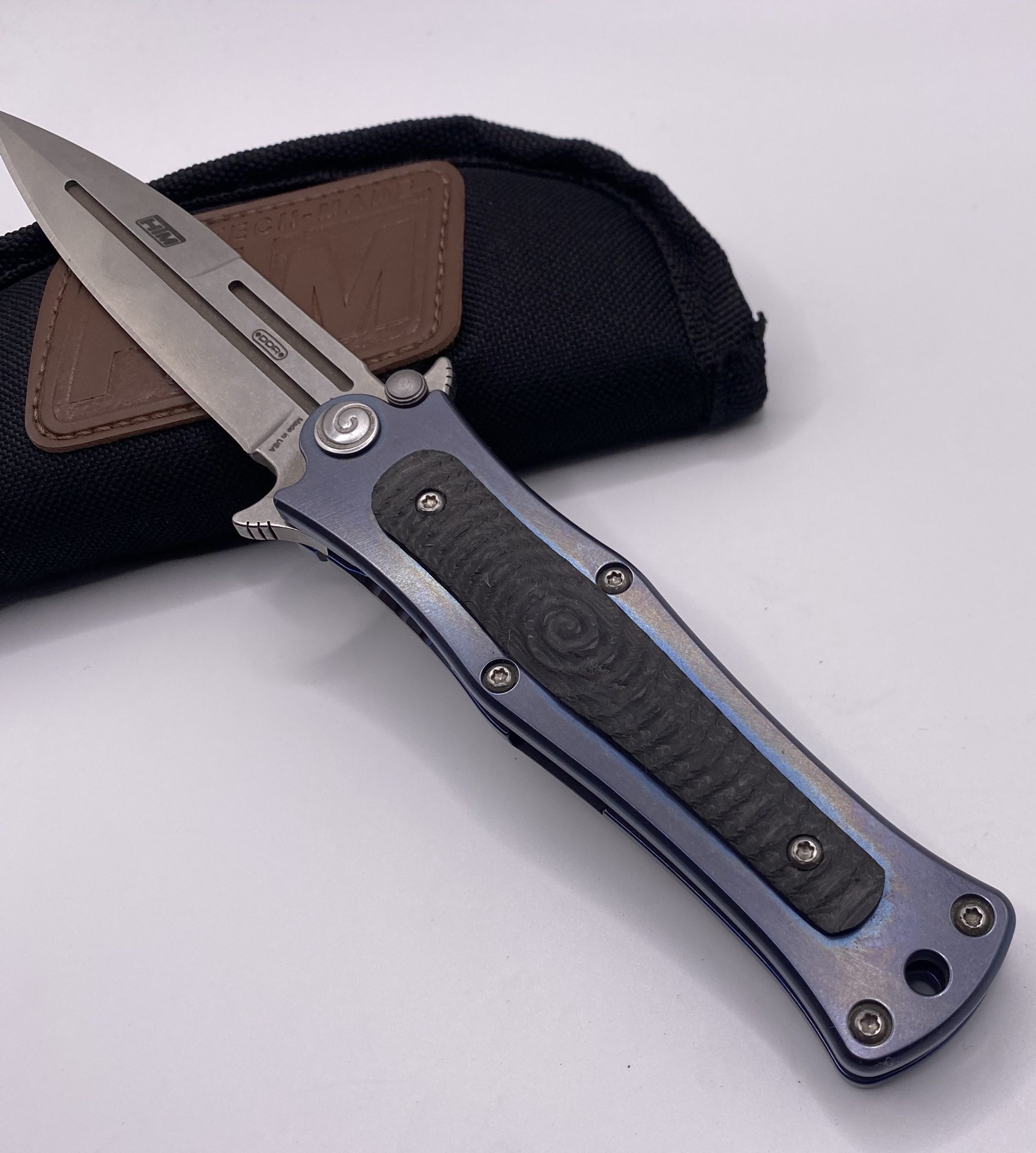 Darel Ralph Madd Maxx 4 assisted opening dagger with anodized blue titanium frame and stonewashed blade